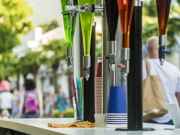 summer open air bar faucet drinks in the city street party