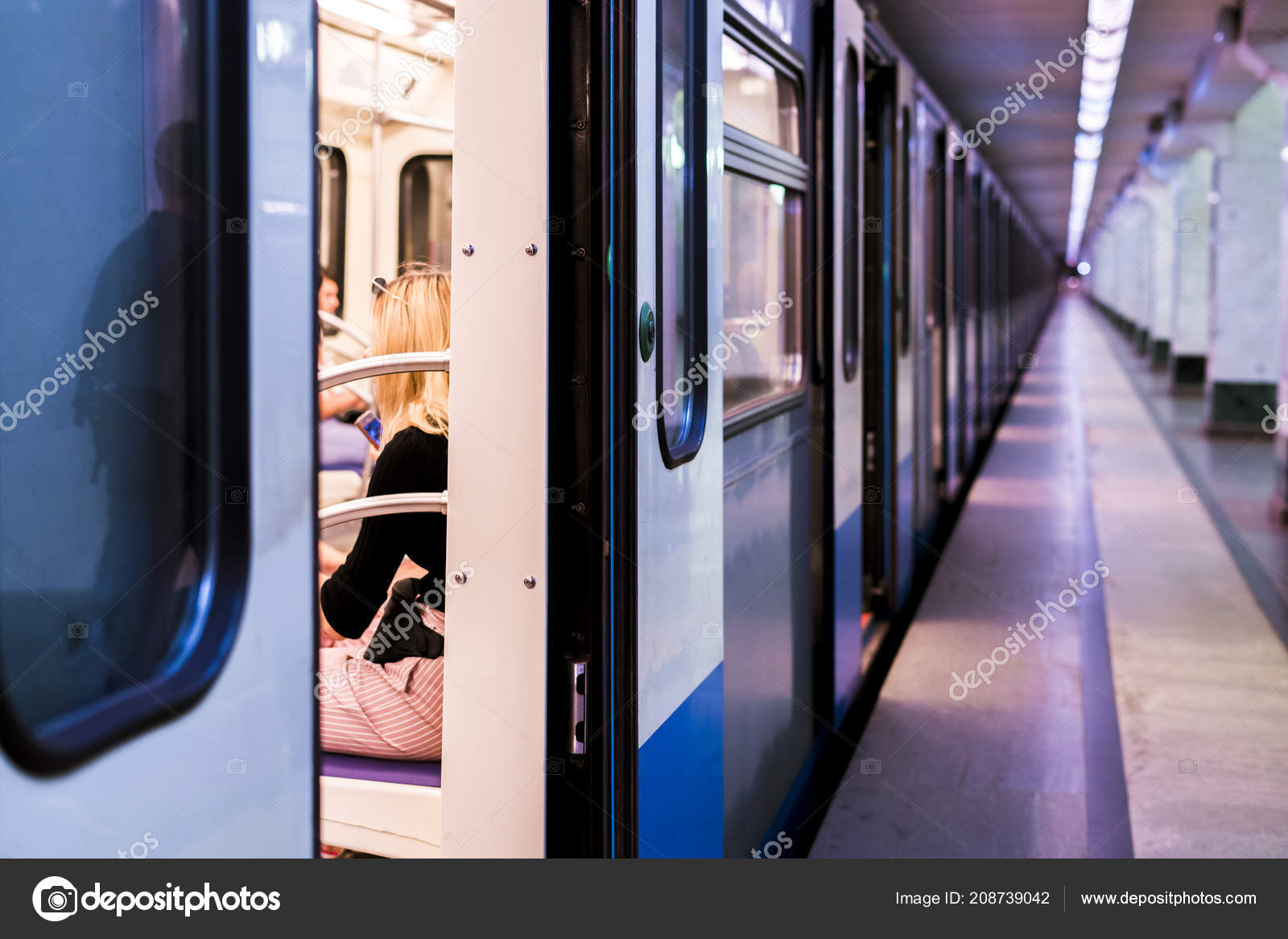 Subway Train Staying Metro Station Doors Open Defocused Background