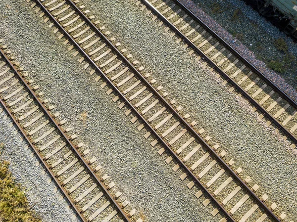 Vista aérea superior de algunas vías de ferrocarril textura aislada f — Foto de Stock