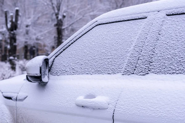Cloaeup photo of car covered in snow in winter season  d — Stock Photo, Image