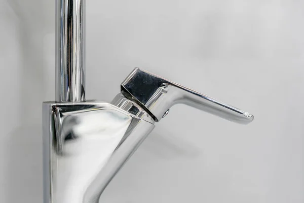 Close up photo of bathroom interior and brand new glittering faucet b — Stock Photo, Image