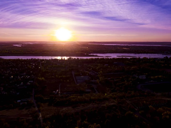 purple vionet sunset sky and river aerial shot