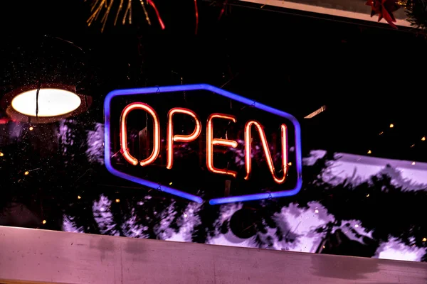 Neon 24 hours open logo sign glowing in the bar store f — Stock Photo, Image