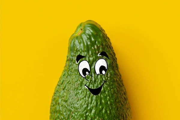 Avocado emoji su sfondo giallo copia spazio b — Foto Stock