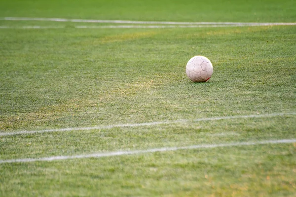 Football soccer ball on the field of grasss — Stock Photo, Image