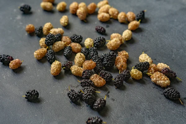 Mulberry berries of white and black color macro shot — Stock Image Mulberry berries of white and black color macro shot Stock Photo