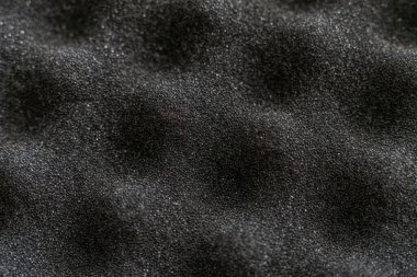 soyut siyah köpük kauçuk doku, makro görünüm, desenli koruma yüzeyi