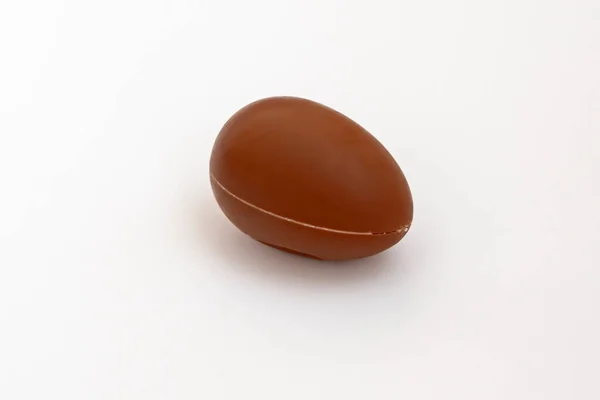 Semplice Uovo Cioccolato Isolato Sullo Sfondo Colorato Concetto Felice — Foto Stock