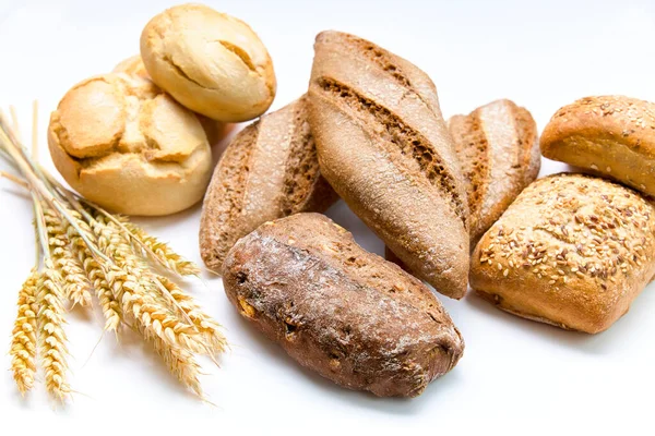 Delicious Breads Next Spikes White Background Bakery Products — Stock Photo, Image