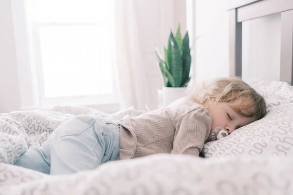 Toddler Sleeping Her Parents Bed Pacifier — Stock Photo, Image