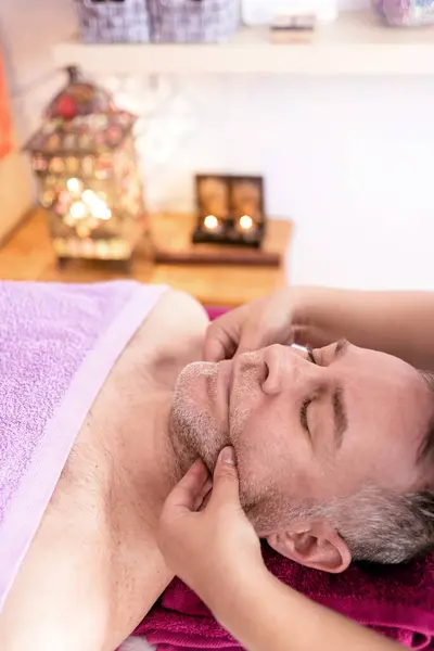 Female Masseuse Massaging Male Patient Face — Stock Photo, Image