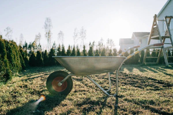 Wheelbarrow Filled Soil Lawn Sunset — Stock Photo, Image