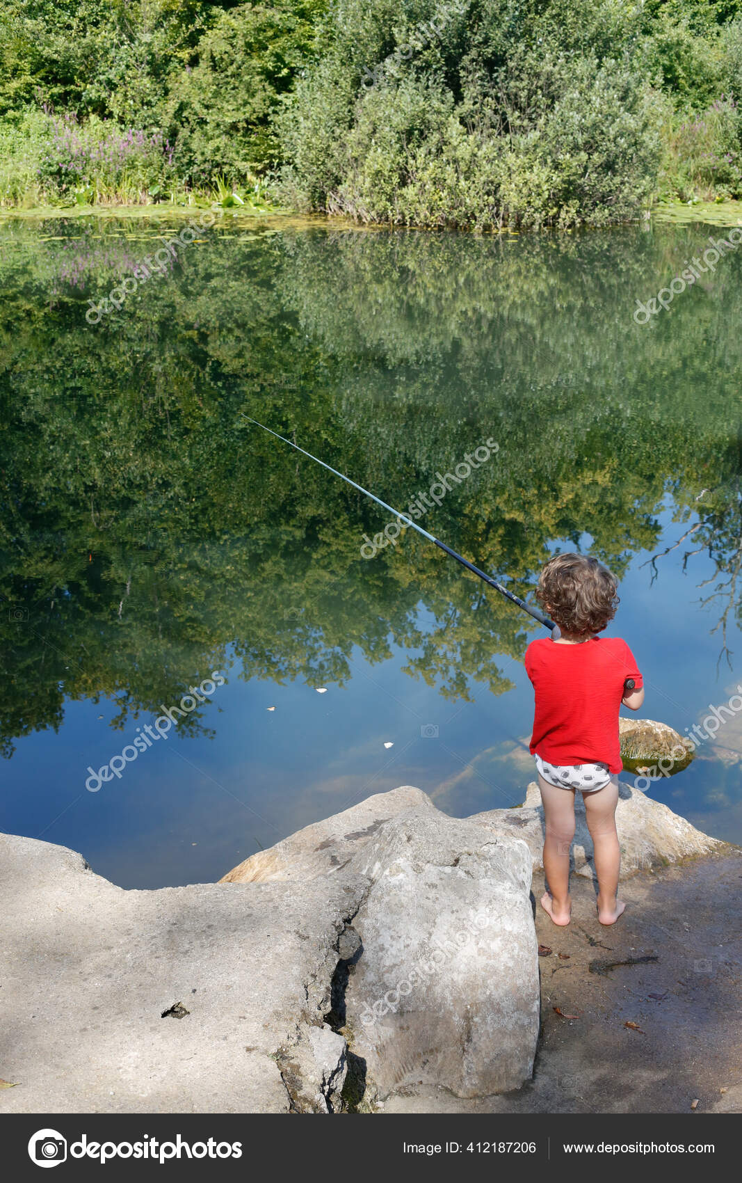 Young Boy Fishing Riverbank Alone His Underwear — Stock Photo © Cavan  #412187206
