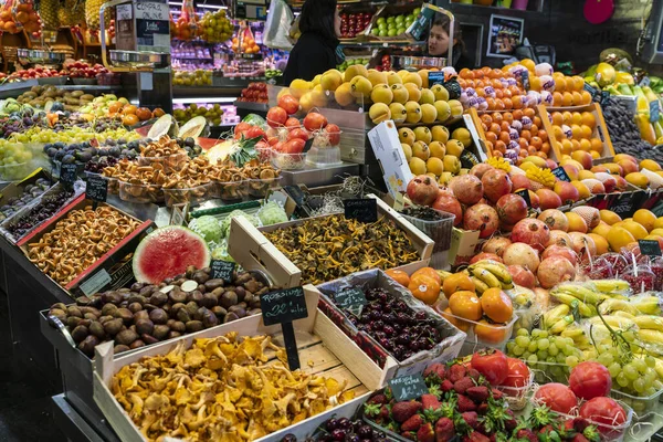 grocery and fruit stand at the Boqueria market in Barcelona
