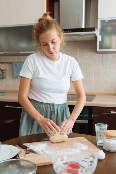 Kneading dough at home. Rustic style photo
