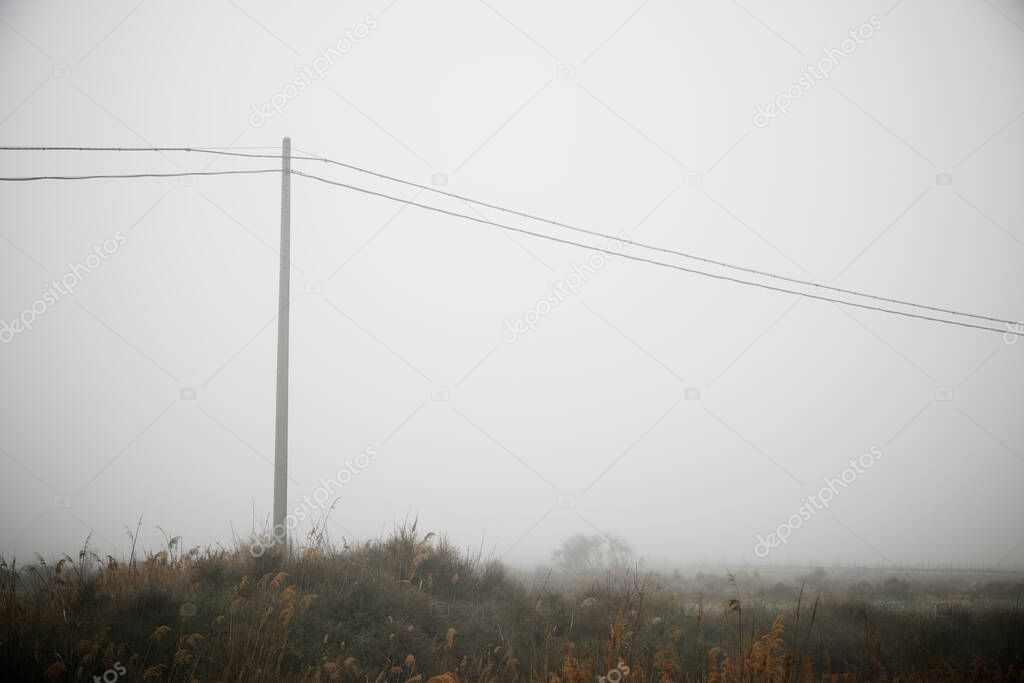 Power line between the fog, Zaragoza province in Spain.