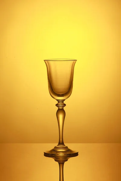 Empty Wine Glass Yellow Background — Stock Photo, Image