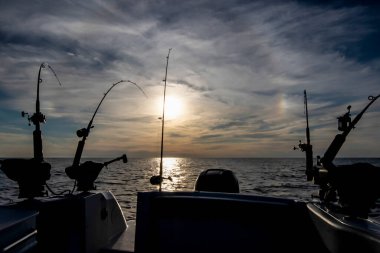Outriggers set for Salmon fishing on Lake Michigan clipart