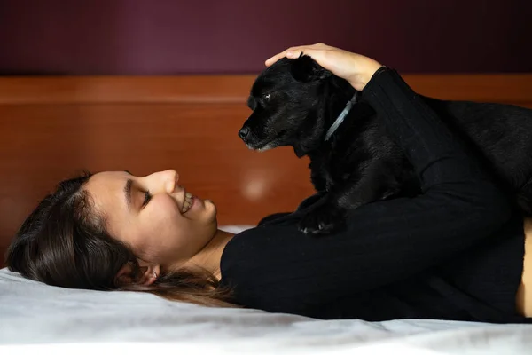Woman Lying Bed Black Dog — Stok fotoğraf