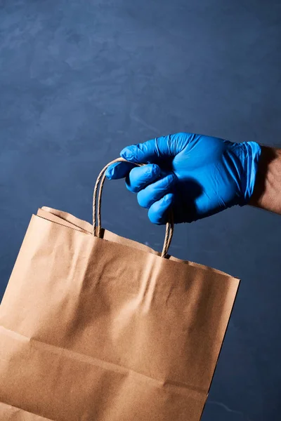 Delivery Brown Paper Bag Held Gloved Hand — Stockfoto