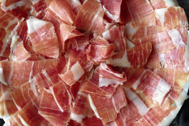 Close up of Iberian ham dish. Gastronomic concept clipart