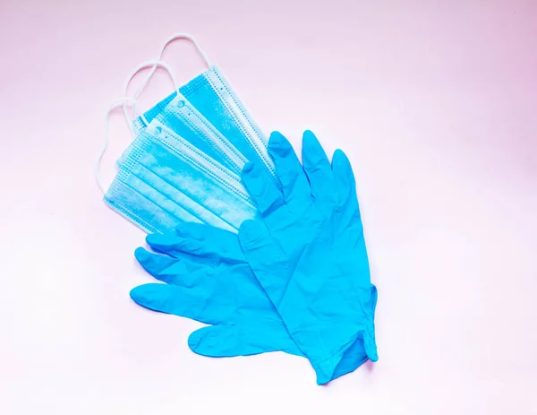 Protective Gloves Masks Pink Background — стоковое фото