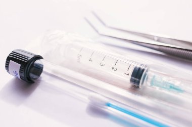 syringe and test swab  on a white background.