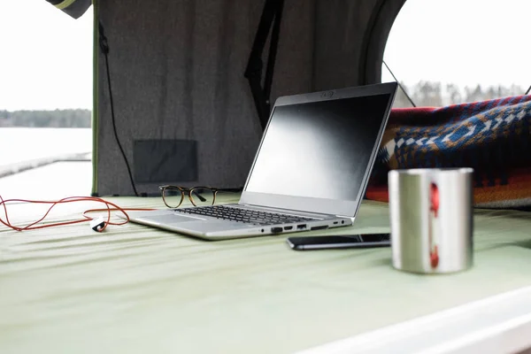 home office set up in a tent for social distancing from the office