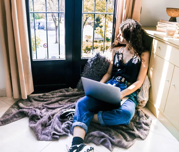 Young Girl Working Home Laptop Next Window — стоковое фото