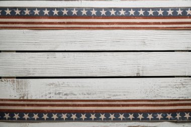 Amerikan yıldızları ve çizgileri kırsal ahşap arka planda yatıyordu. 