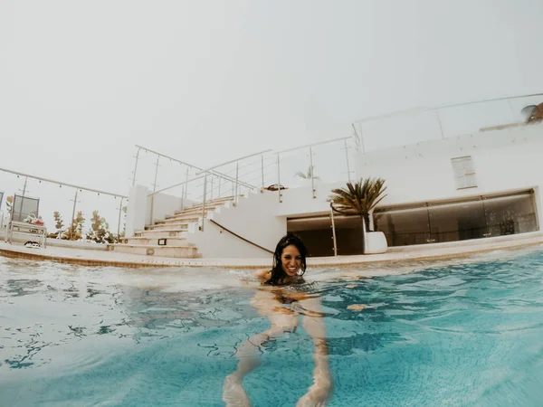 Young Woman Smiles She Kicks Her Legs Underwater Pool — Stock Photo, Image