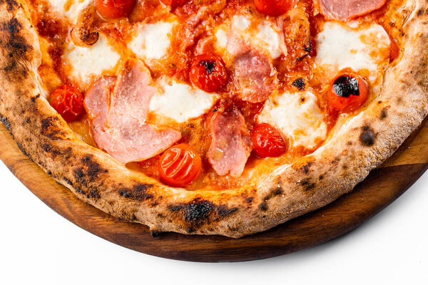 Italian oven pizza with tomatoes and ham