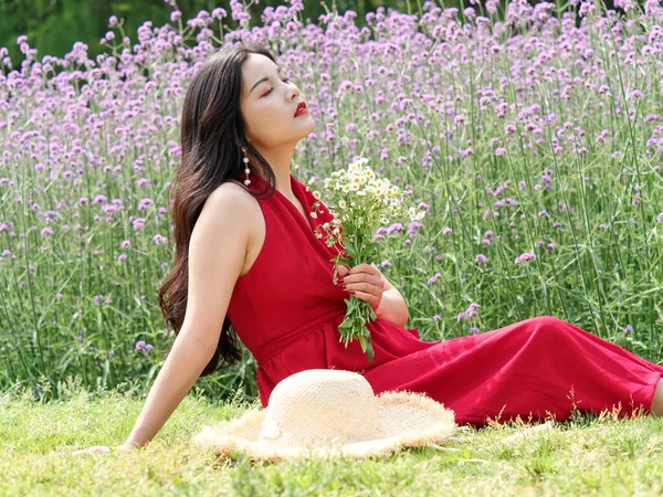 Portrait Young Chinese Girl Red Dress Verbena Flowers Field — стокове фото