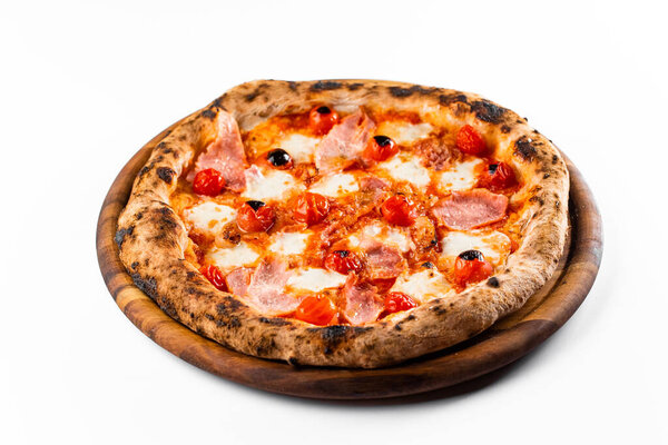 Italian oven pizza with tomatoes and ham