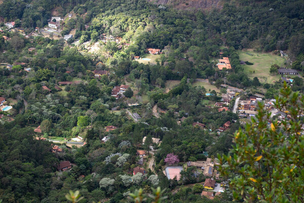 Beautiful view to mountain houses on rainforest mountain area near Rio de Janeiro, Brazil