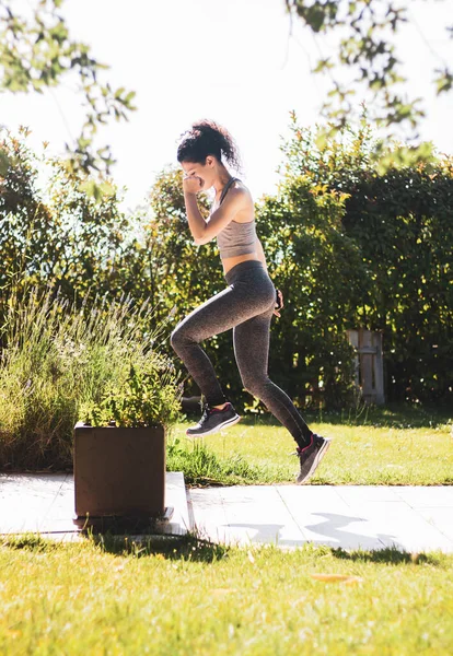 Young Woman Exercising Her Home Garden — Fotografia de Stock