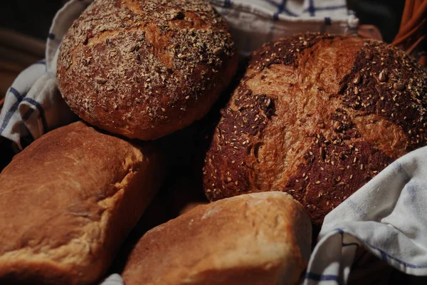 Freshly Baked Bread Sesame Seeds Wheat Wooden Table — Zdjęcie stockowe