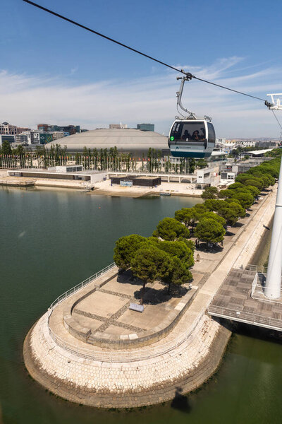 Beautiful view to cable car over city in Parque das Nacoes area, Lisbon, Portugal