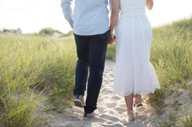 romantic loving couple posing at the ocean beach