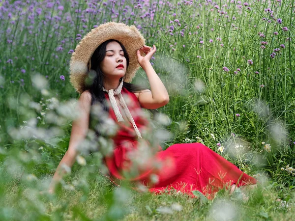 Portrait Young Chinese Girl Red Dress Verbena Flowers Field — стокове фото