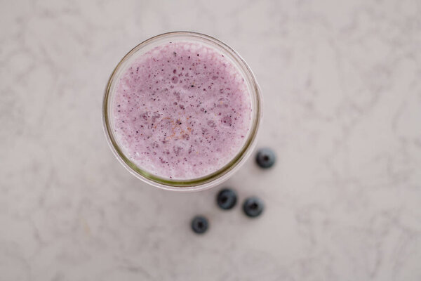 fresh smoothie with berries on a white background