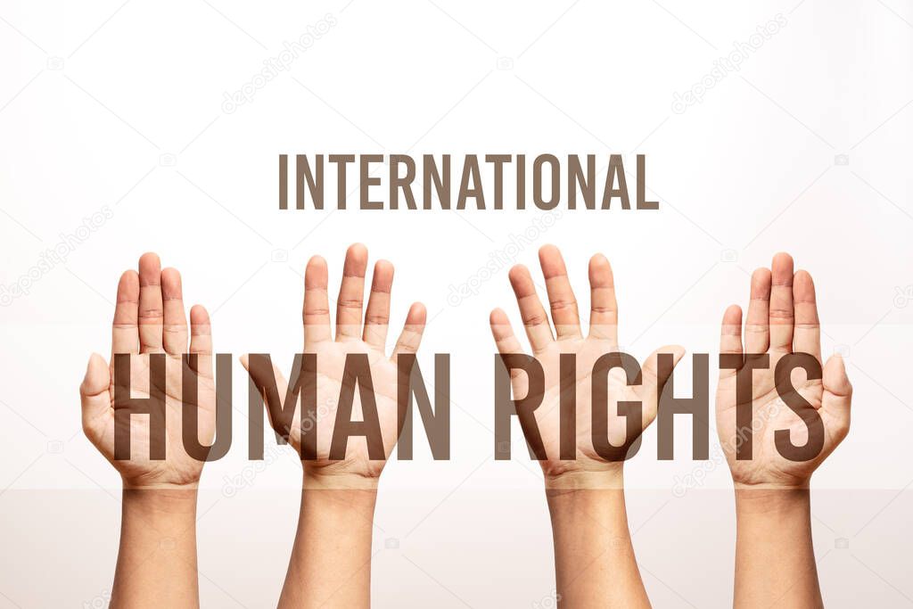 International Human Rights Day concept, raise hand up