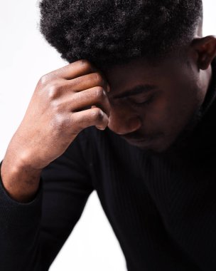 Close up of upset black man think about something