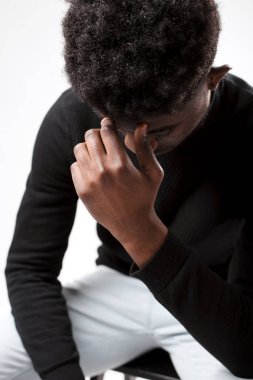 Close up of upset black man think about something