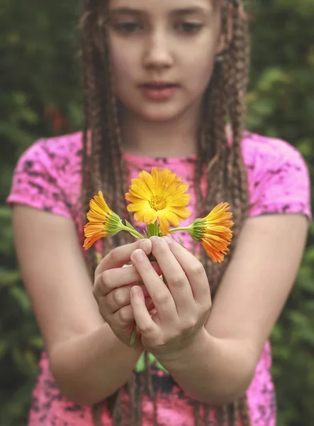 Cute Girl Holds Flowers Outstretched Arms — Stock Photo, Image