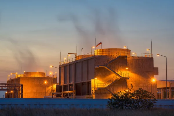 power plant at sunset.	