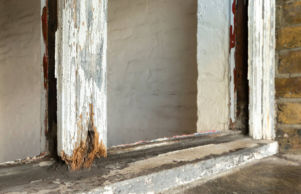 Close up of rotten sash window frame