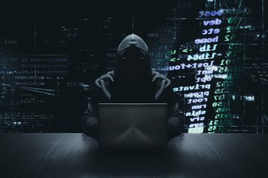 İkili kod arka plan önünde onun bilgisayar ile anonim hacker