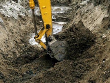 Çukurkazma ekskavatör kova fotoğrafı. 