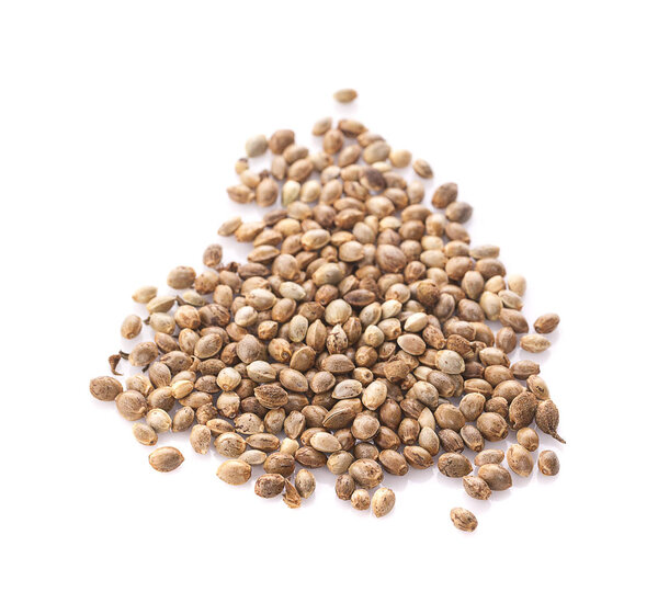 Heap of hemp seeds on white background